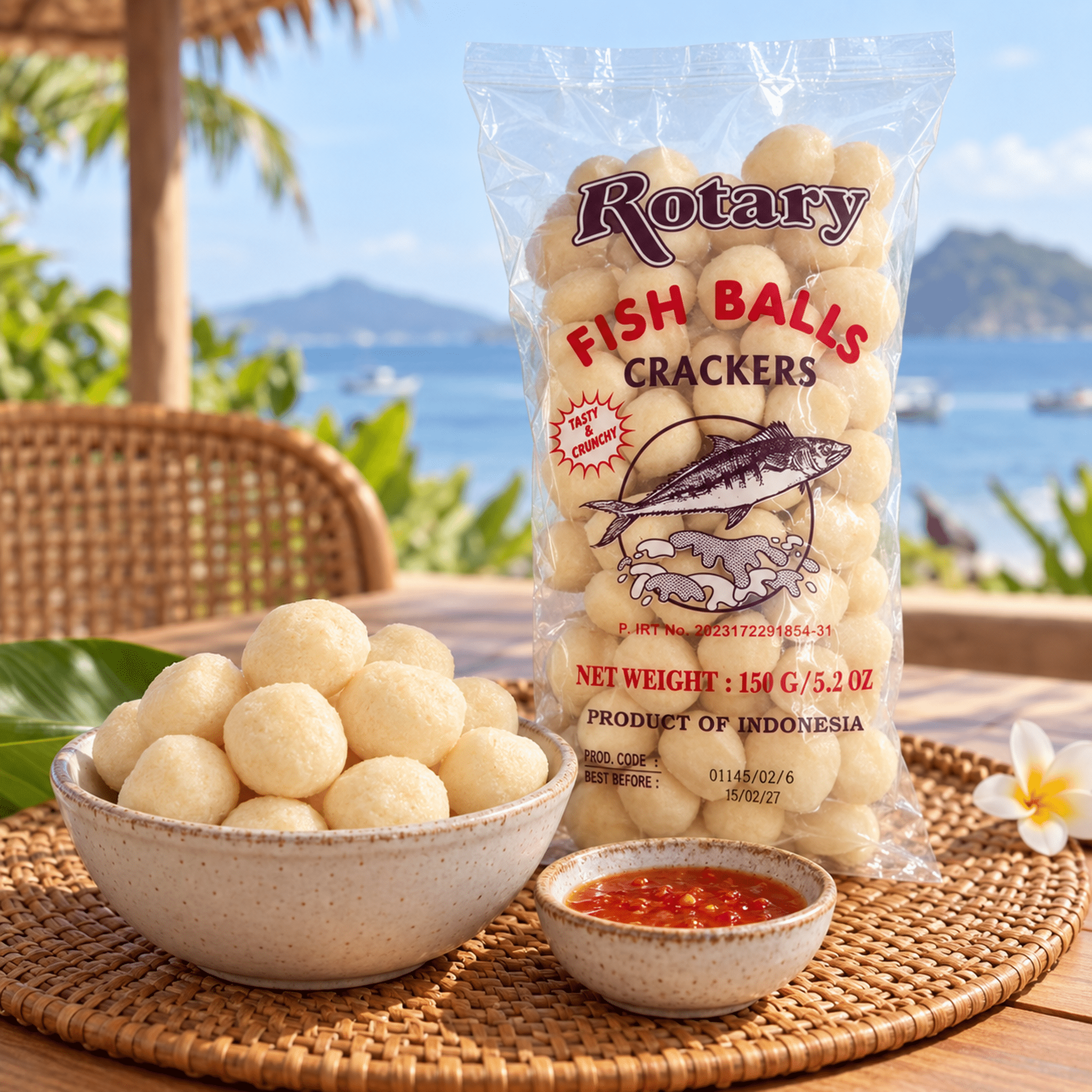 Rotary Fish Balls Crackers 150g Lifestyle | Snack Affair Archives Transparent bag of Rotary fish balls crackers on a wicker placemat with bowls of sauce and a sunny outdoor backdrop.