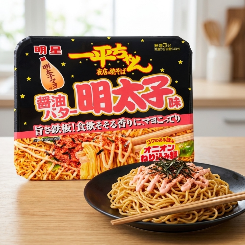 Myojo Ippeichan Yakisoba Mentaiko | Snack Affair Archives Pack of Japanese instant noodles with a plate of cooked noodles topped with pink sauce and seaweed, on a wooden table.