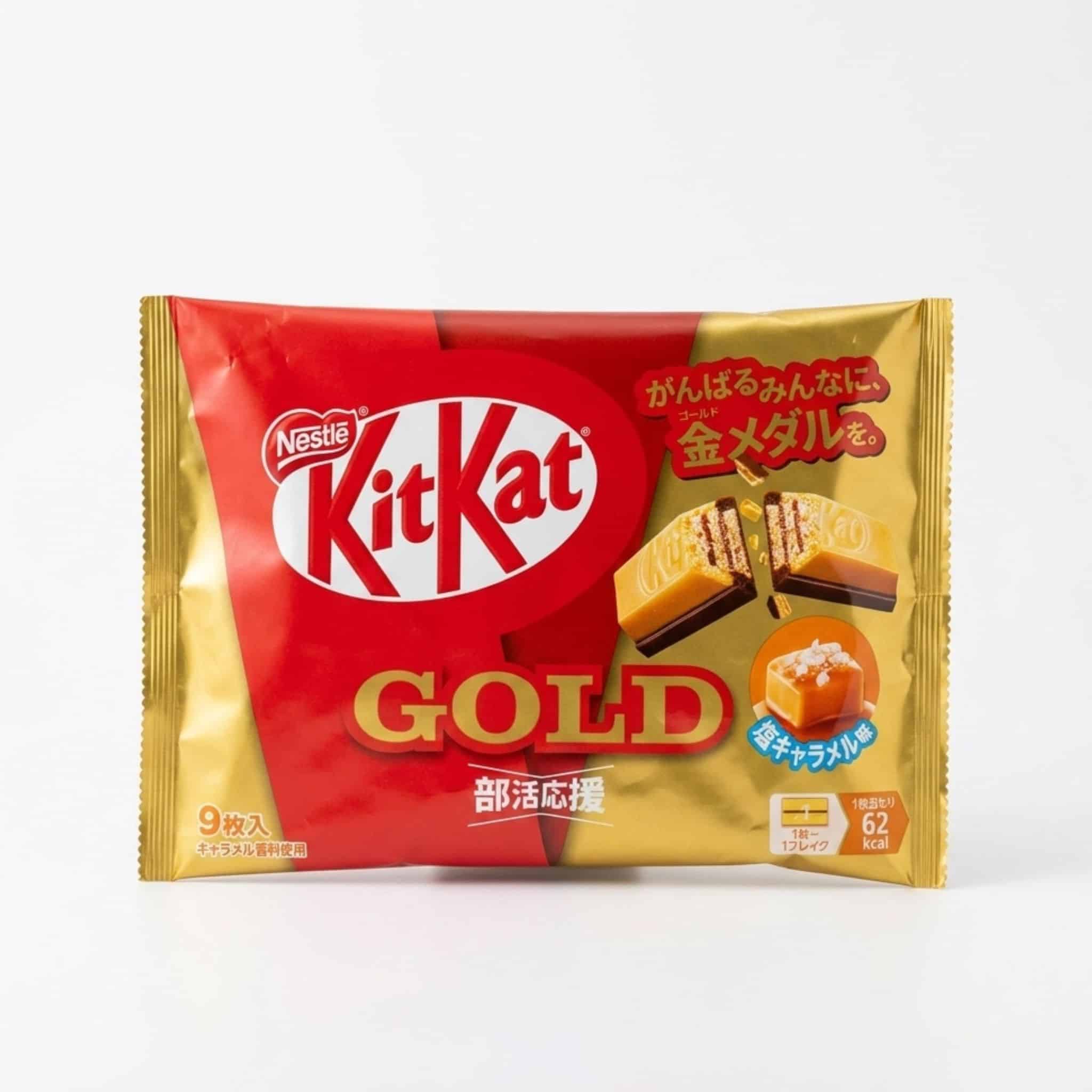 Japanese Kit Kat Gold Salt Caramel Flavour | Snack Affair Archives Close-up of a Nestlé KitKat Gold chocolate bar wrapper in red and gold with Japanese text and caramel imagery