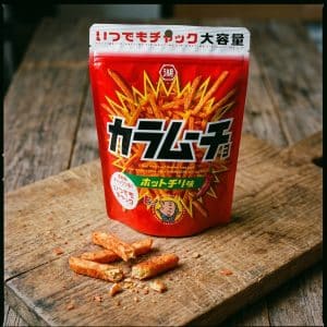 Archives Red bag of Japanese spicy fries on a wooden table, with several fry sticks scattered in front.