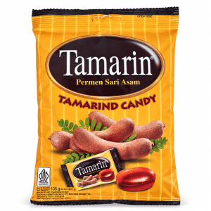 Bright yellow bag labeled 'Tamarin' Tamarind Candy with images of tamarind pods on the front.